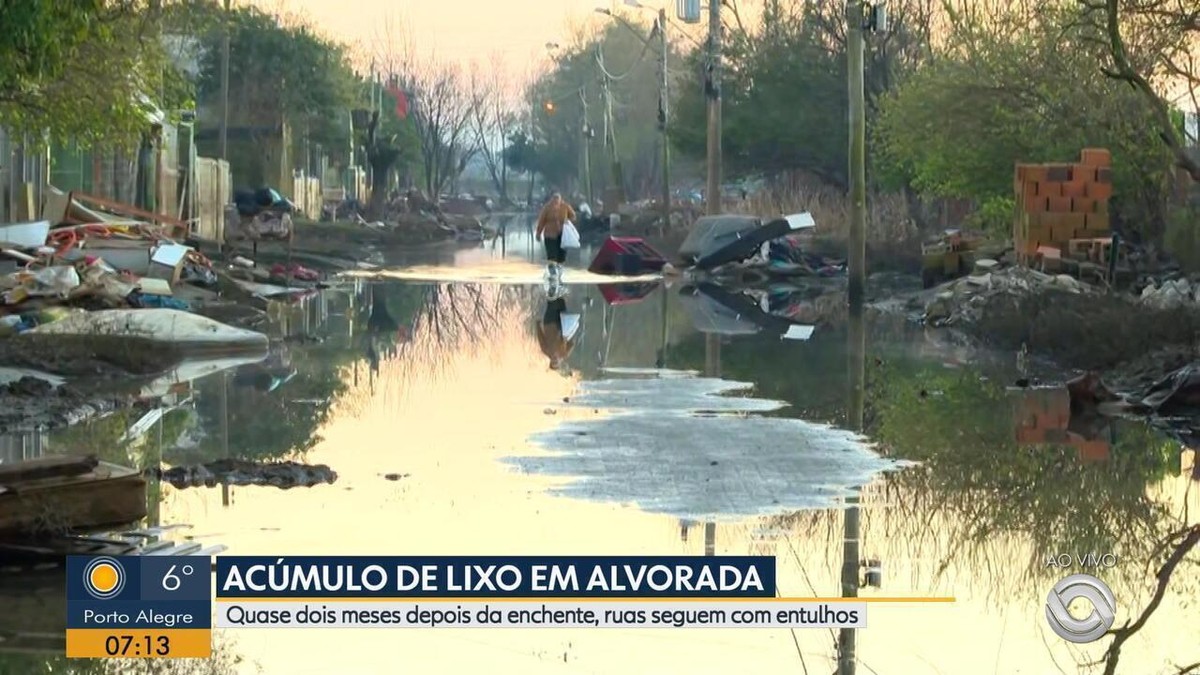 População de Alvorada convive ruas alagadas lixo e esgoto dois