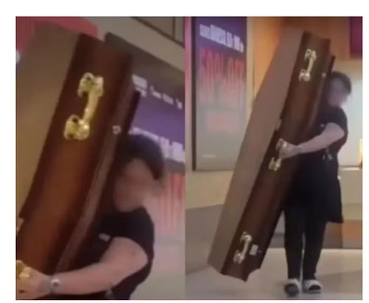 Mulher inova e leva caixão para encher de pipoca em cinema de Santo André