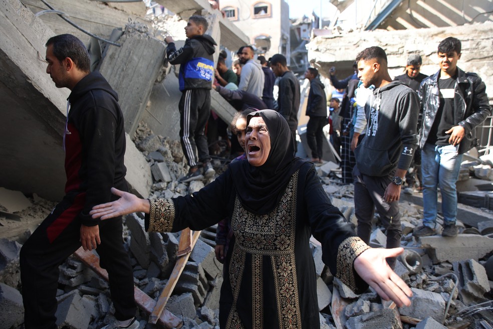 A maioria das vítimas estava próxima de um veículo que oferecia carregamentos de ajuda para Gaza. — Foto: Omar AL-QATTAA/AFP