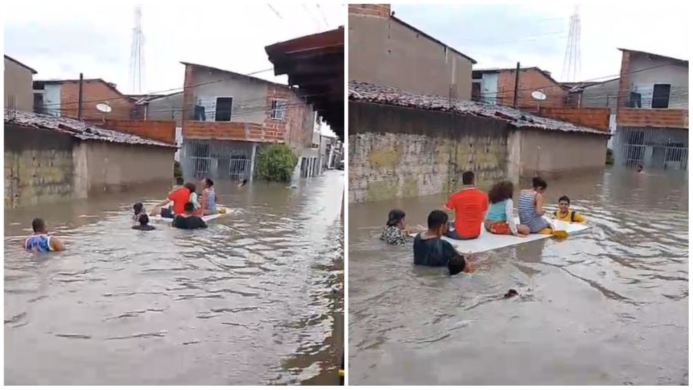 Família é retirada de casa com a ajuda de vizinhos após canal transbordar no Bairro Genibaú, em Fortaleza. — Foto: Arquivo pessoal