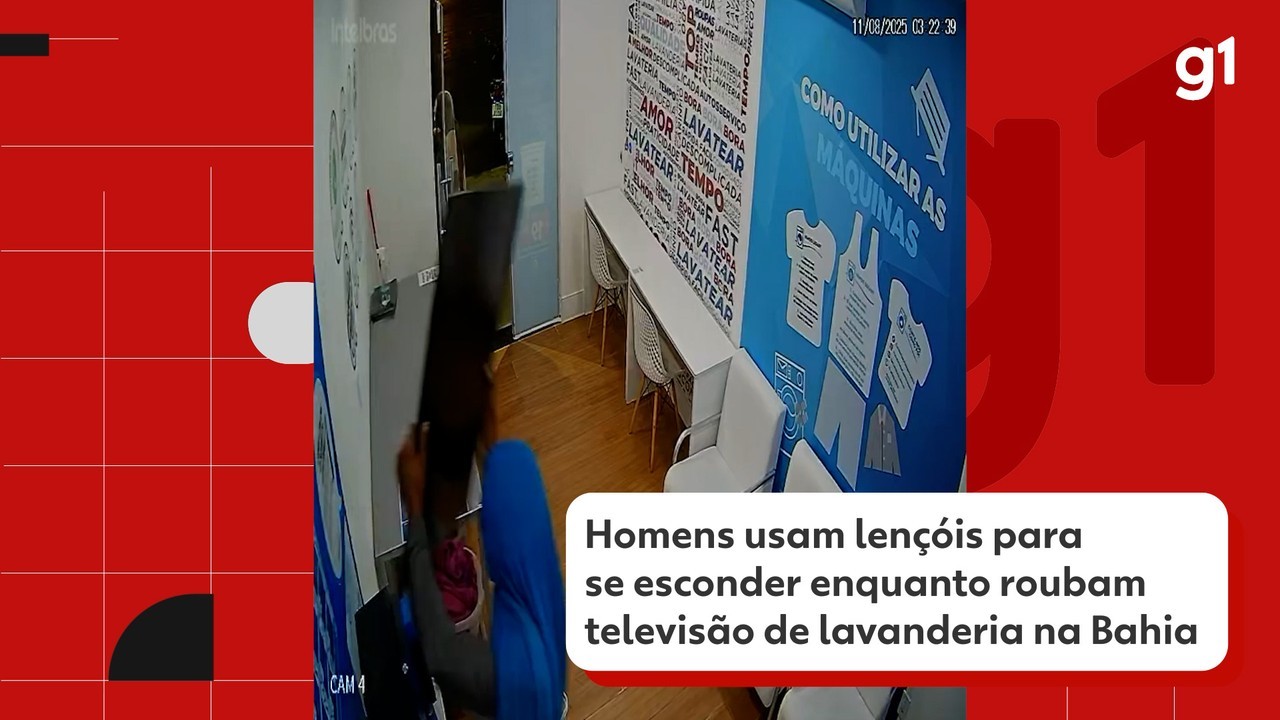 VÍDEO: homens colocam lençóis na cabeça para roubar televisão de lavanderia na Bahia