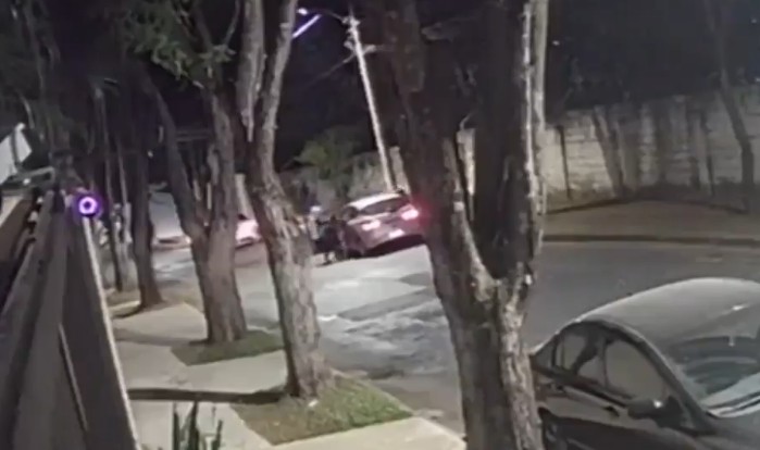 Mulher é puxada pelos cabelos durante tentativa de roubo de carro em BH; VÍDEO