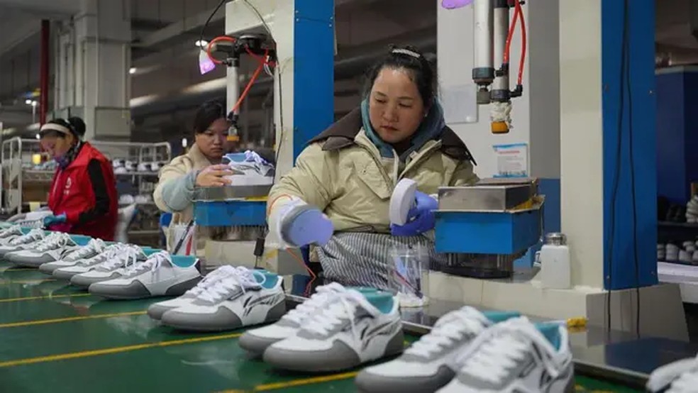 A China busca competir com grandes marcas após décadas sendo a "fábrica do mundo". — Foto: Getty Images via BBC