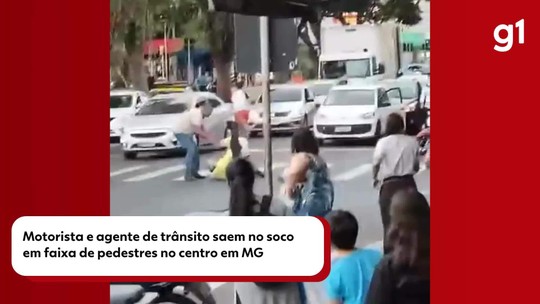 VÍDEO: Agente de trânsito e motociclista saem no soco no meio de avenida, no Centro de Uberlândia - Programa: G1 Triângulo Mineiro 