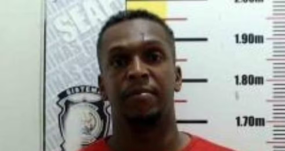 Jô dando entrada no sistema prisional — Foto: Reprodução