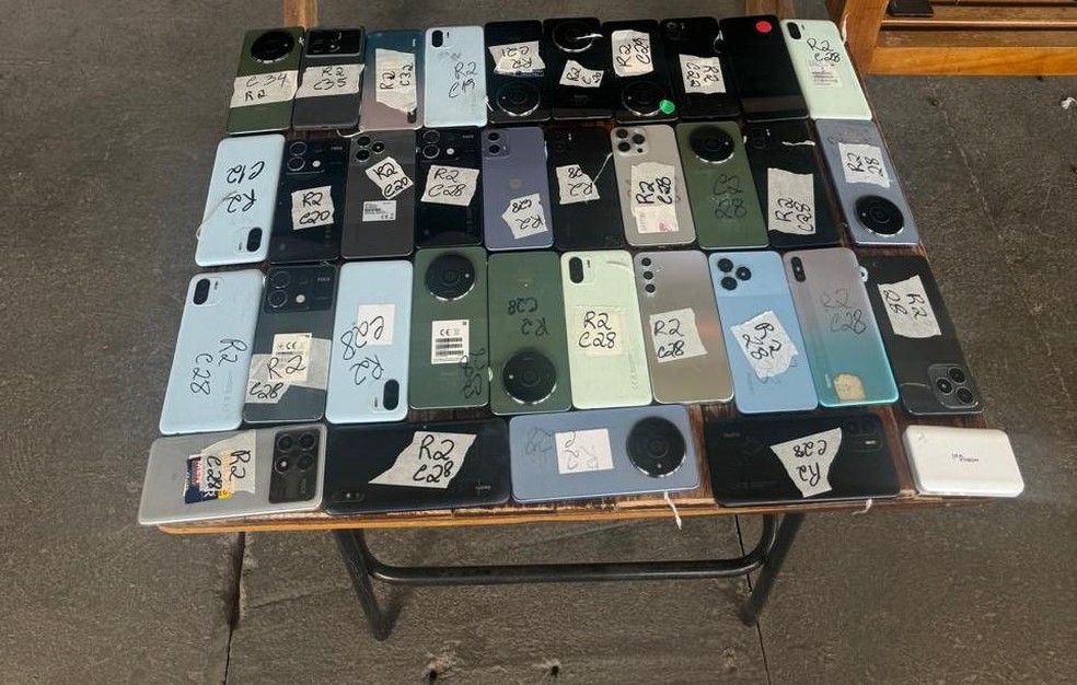 Também  foram apreendidos 353 chips, 361 carregadores e 125 fones de ouvido. — Foto: Secretaria de Estado de de Segurança Pública (SESP)