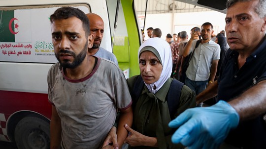 Ao menos 60 palestinos são mortos a tiros enquanto esperavam ajuda humanitária em Gaza, diz agência - O Ministério da Saúde de Gaza informou que 67 palestinos foram mortos por tiros israelenses enquanto aguardavam caminhões de ajuda da ONU no norte da Faixa de Gaza.