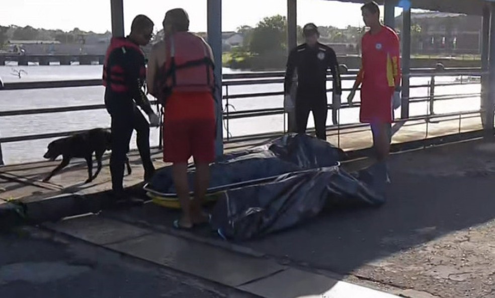 Corpos no Grupamento Marítimo Fluvial, no aguardo da Polícia Científica para a remoção. — Foto: Reprodução / TV Liberal