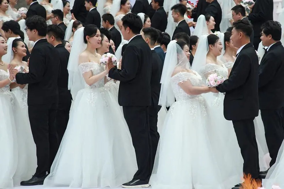 O governo chinês vem promovendo os papéis tradicionais de gênero (BBC) — Foto: AFP via Getty Images (BBC)