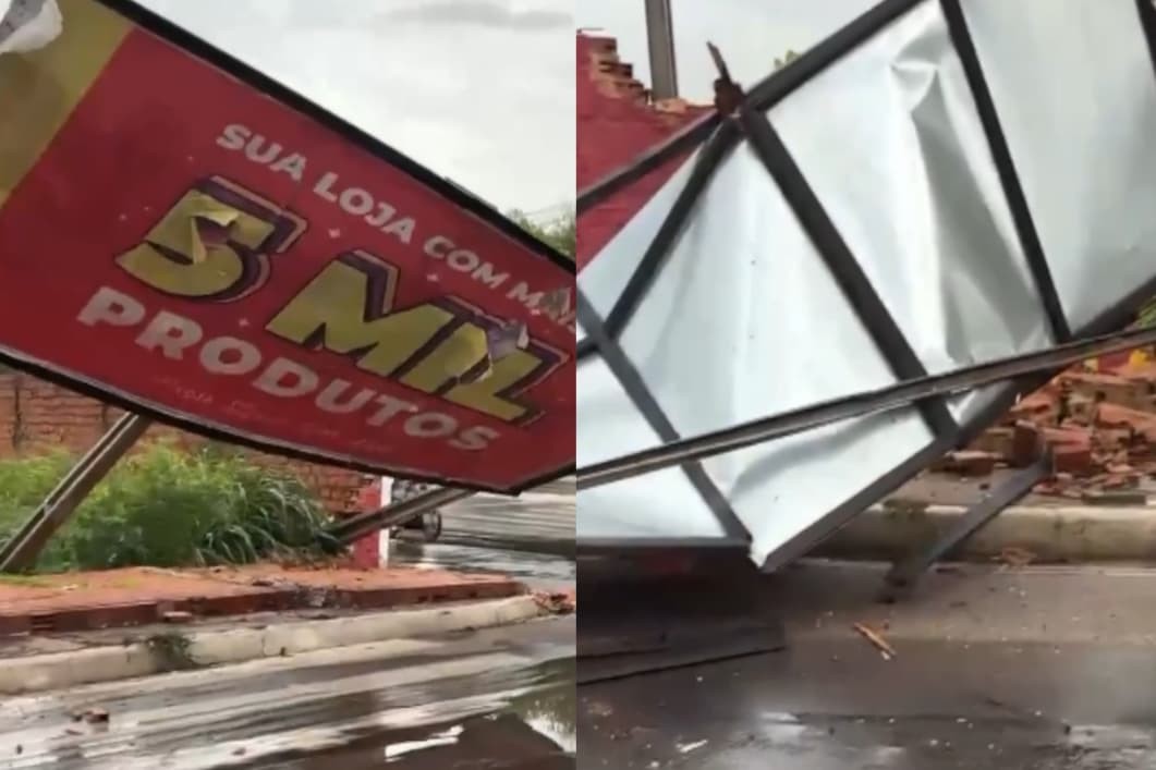 Muro com outdoor e árvores caem durante forte chuva em Teresina