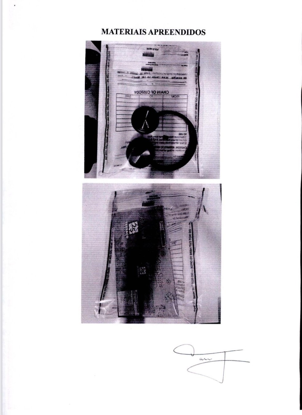 Equipamentos estavam em uma caixa de panetone e foram identificados por detector de metal — Foto: Reprodução