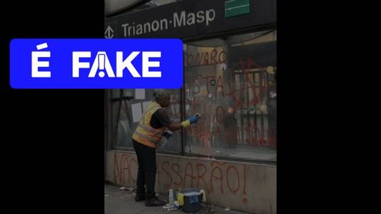 É #FAKE foto de mulher limpando pichação em Metrô após ato de Lula