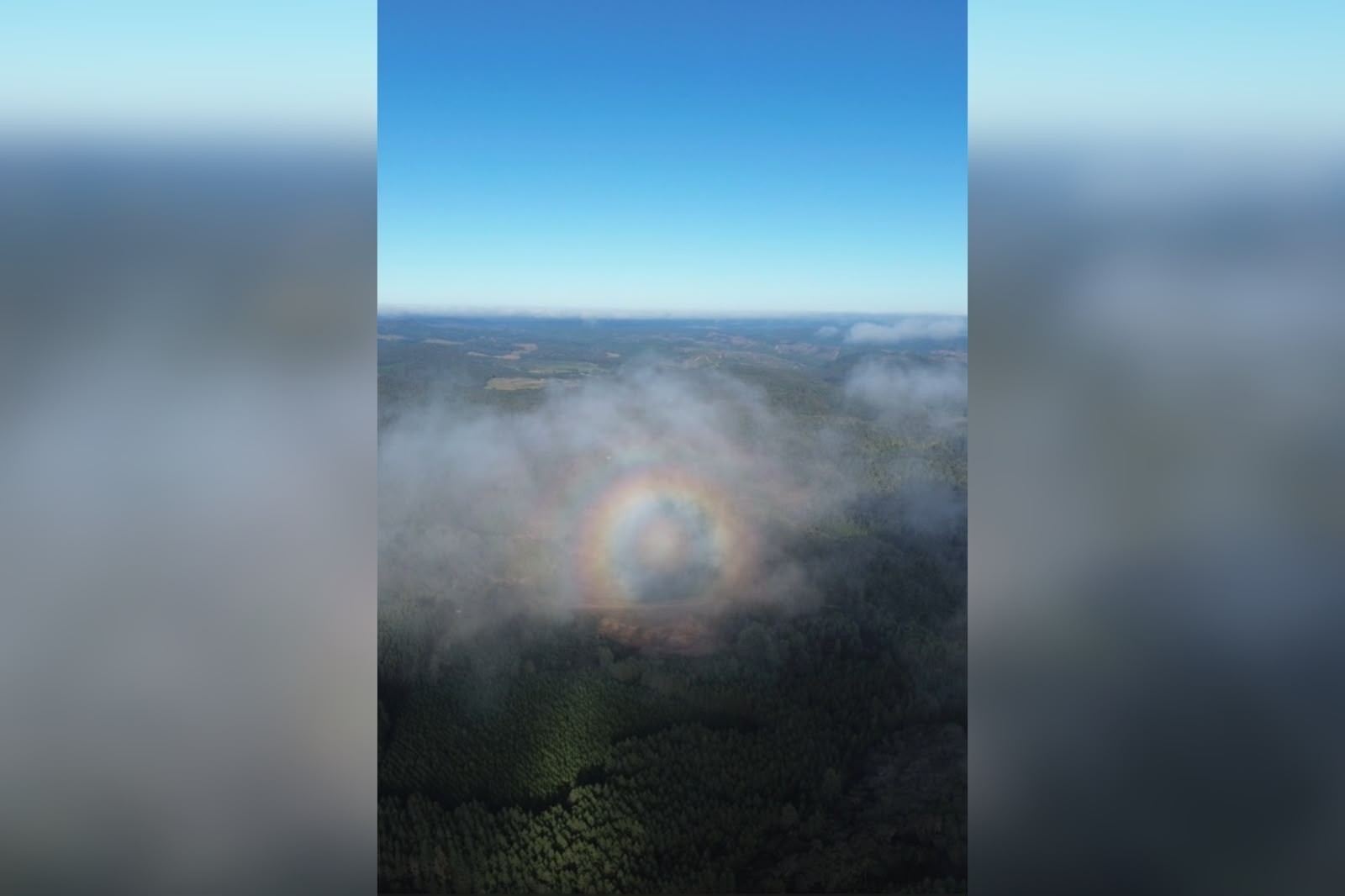 VÍDEO: fenômeno raro forma arco-íris circular ao redor de drone durante amanhecer no interior de SP