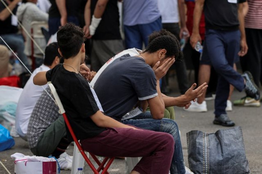 Vindos de um país com problemas econômicos e sociais, sobreviventes de tragédia migratória enfrentam agora novas incertezas sobre seu futuro.  — Foto: Reuters via BBC