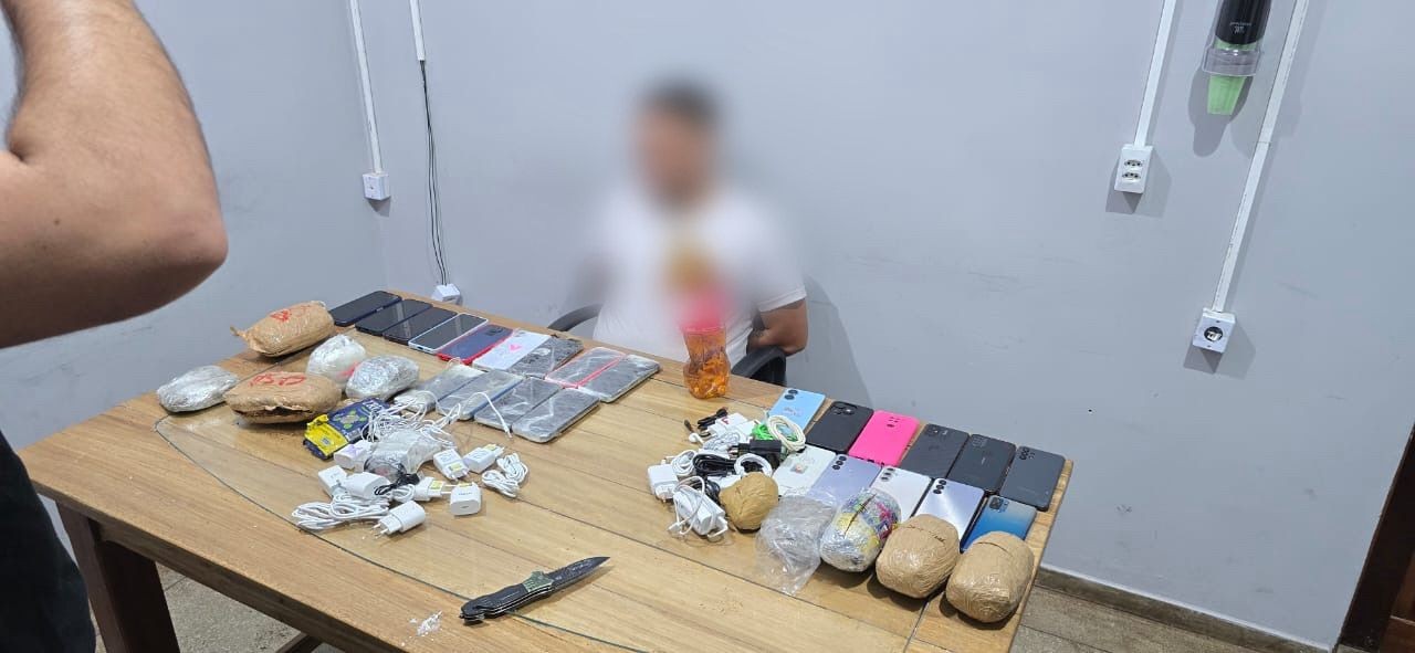Policial penal é flagrado tentando entrar com drogas, celulares e uísque em presídio do AP 