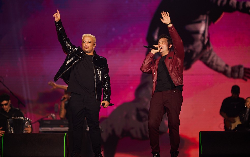 Matheus e Kauan cantam sucessos da carreira na Festa do Peão de Barretos 2025 — Foto: Érico Andrade/g1