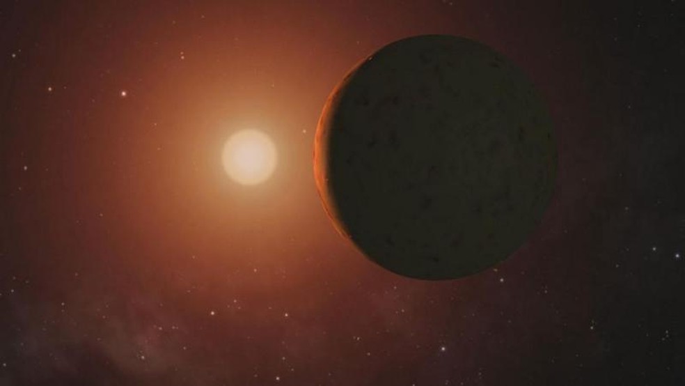 Existem pelo menos três planetas em órbita da anã vermelha TRAPPIST-1 na chamada 'zona habitável' da estrela, onde pode existir água em estado líquido — Foto: Nasa/BBC