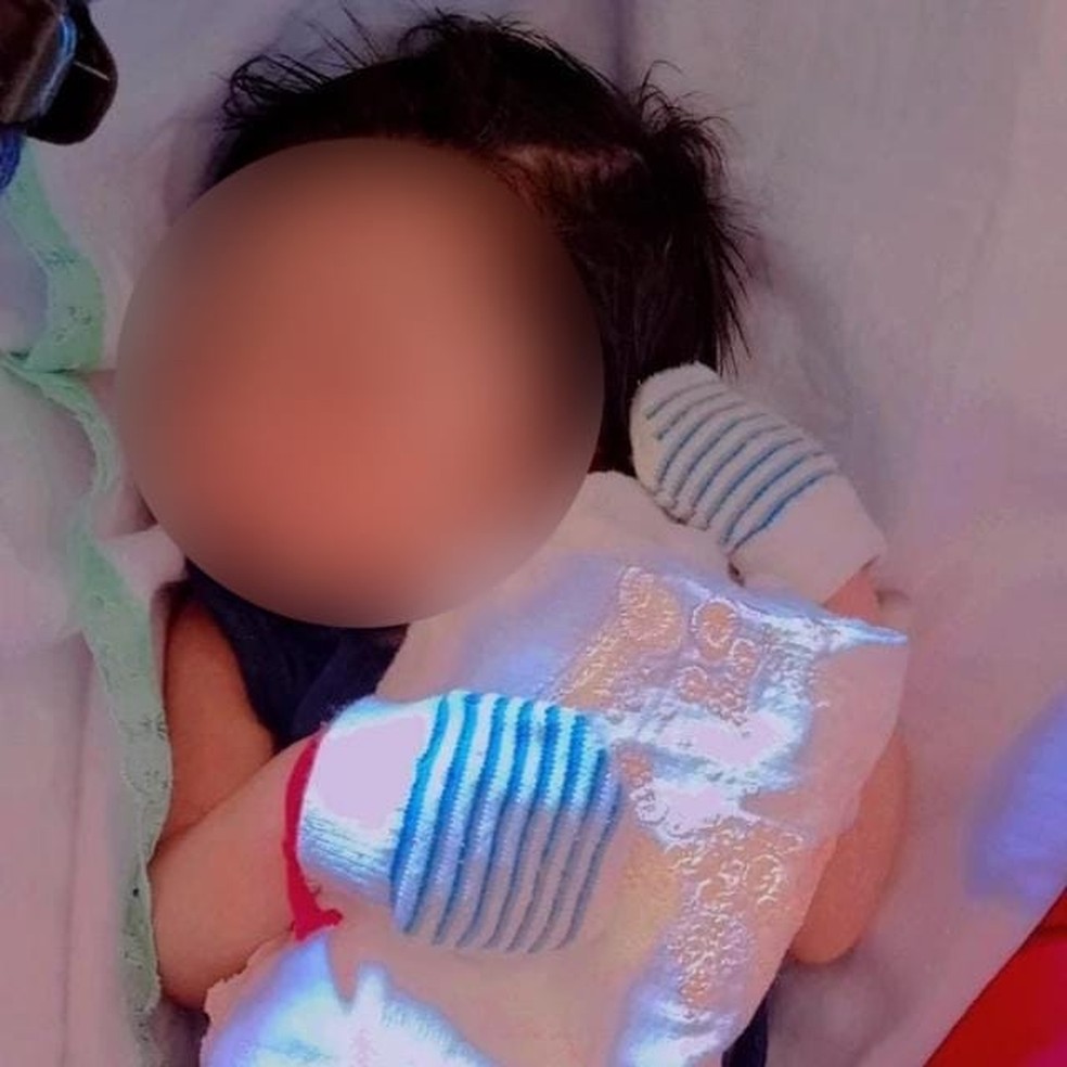 Bebê de 2 meses que levou tiro na cabeça em ataque na Cidade do Povo segue em estado grave na UTI — Foto: Arquivo pessoal