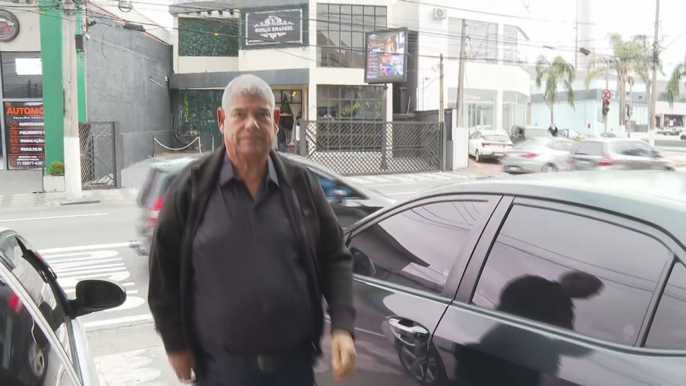 Milton Leite se entrega à polícia — Foto: Reprodução/TV Globo