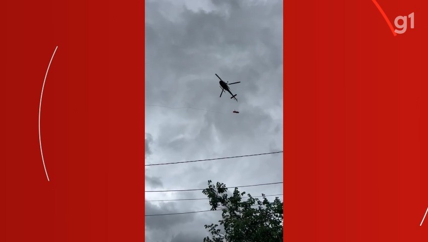 VÍDEO: Homem é resgatado pelo helicóptero da PM após cair de 7 metros de altura em caixa d'água