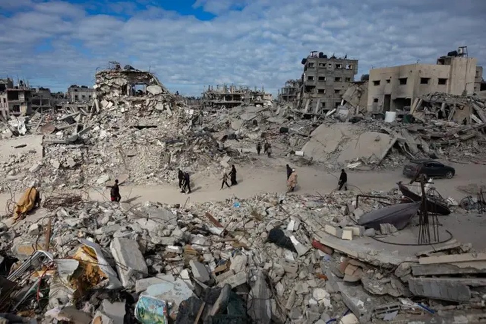 Quinze meses de guerra devastaram Gaza — Foto: AITHAM IMAD/EPA