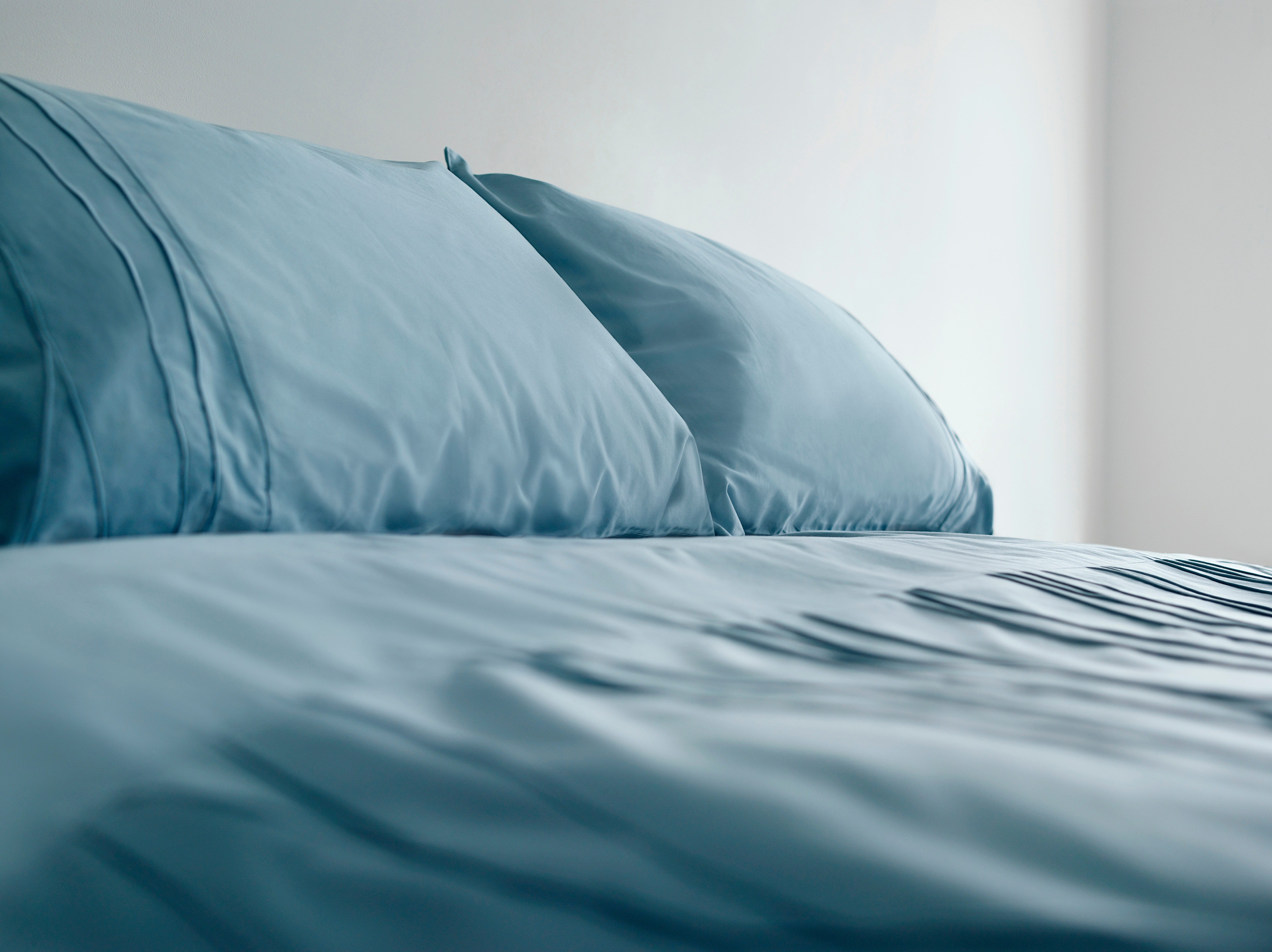 A importância de lavar a roupa de cama