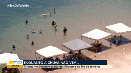 Enquanto a chuva não vem, moradores e turistas aproveitam as praias para aliviar o calor