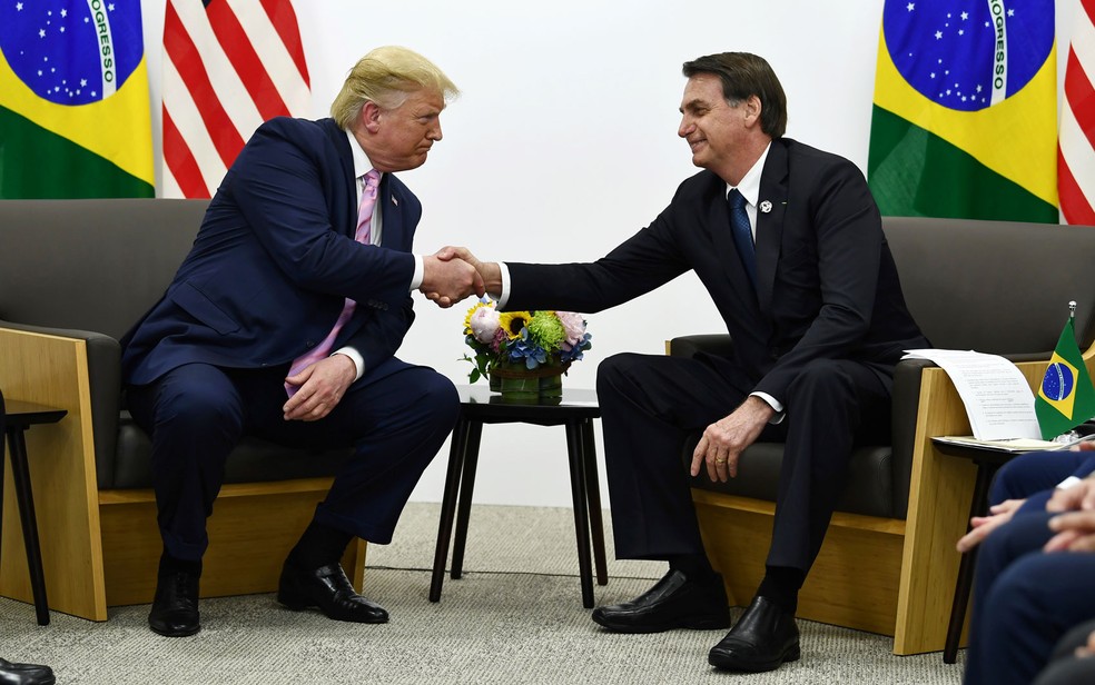 Donald Trump e Jair Bolsonaro, em foto de 2019 — Foto: Brendan Smialowski / AFP Photo