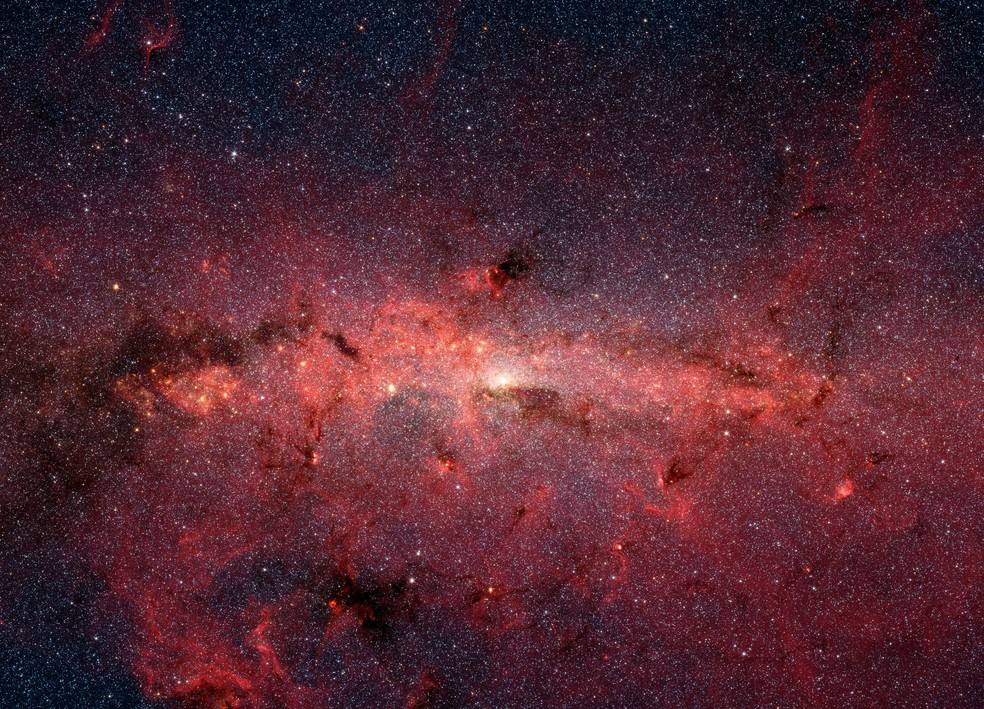 Imagem do centro da Via Láctea, região onde a molécula de eritrulose foi detectada no espaço. — Foto: NASA/Caltech/Susan Stolovy (SSC/Caltech)