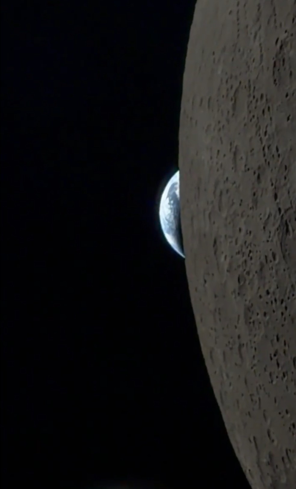 Comandante da missão registrou o fenômeno pela janela da cápsula Orion enquanto sobrevoava o lado distante do nosso satélite natural. — Foto: Reid Wiseman/NASA