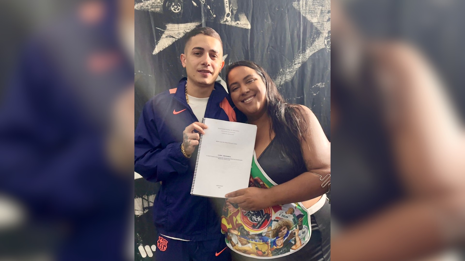 VÍDEO: Jovem faz TCC sobre música de MC Hariel e viraliza ao entregar cópia para o cantor em MG