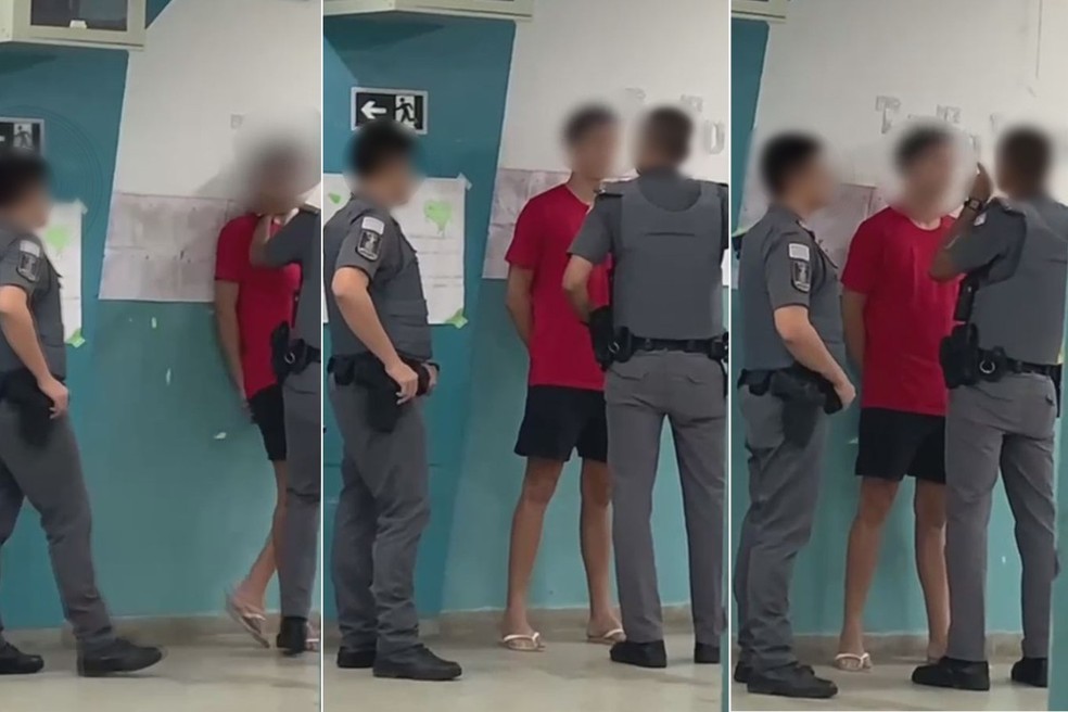 Estudante de 16 anos é abordado por policiais militares dentro de escola, no bairro Ponta da Praia, em Santos, SP — Foto: Reprodução