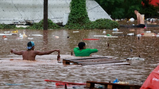 60 pessoas seguem desaparecidas no RS após chuvas intensas - Foto: (Diego Vara/Reuters)
