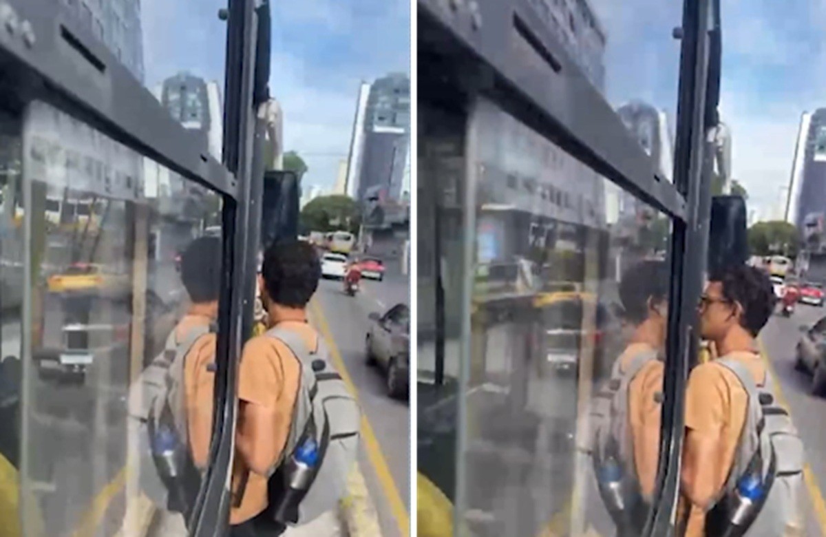 Jovem é flagrado pendurado em ônibus após motorista se recusar a abrir a porta em Belém; VÍDEO 