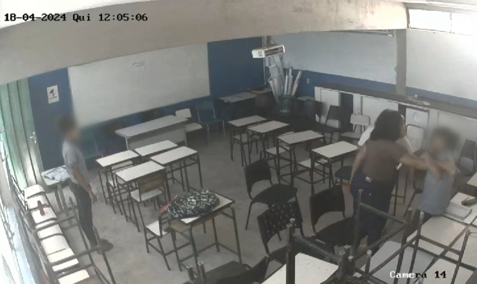 Servidora é afastada suspeita de agredir aluno em escola da Grande BH — Foto: TV Globo/ Reprodução