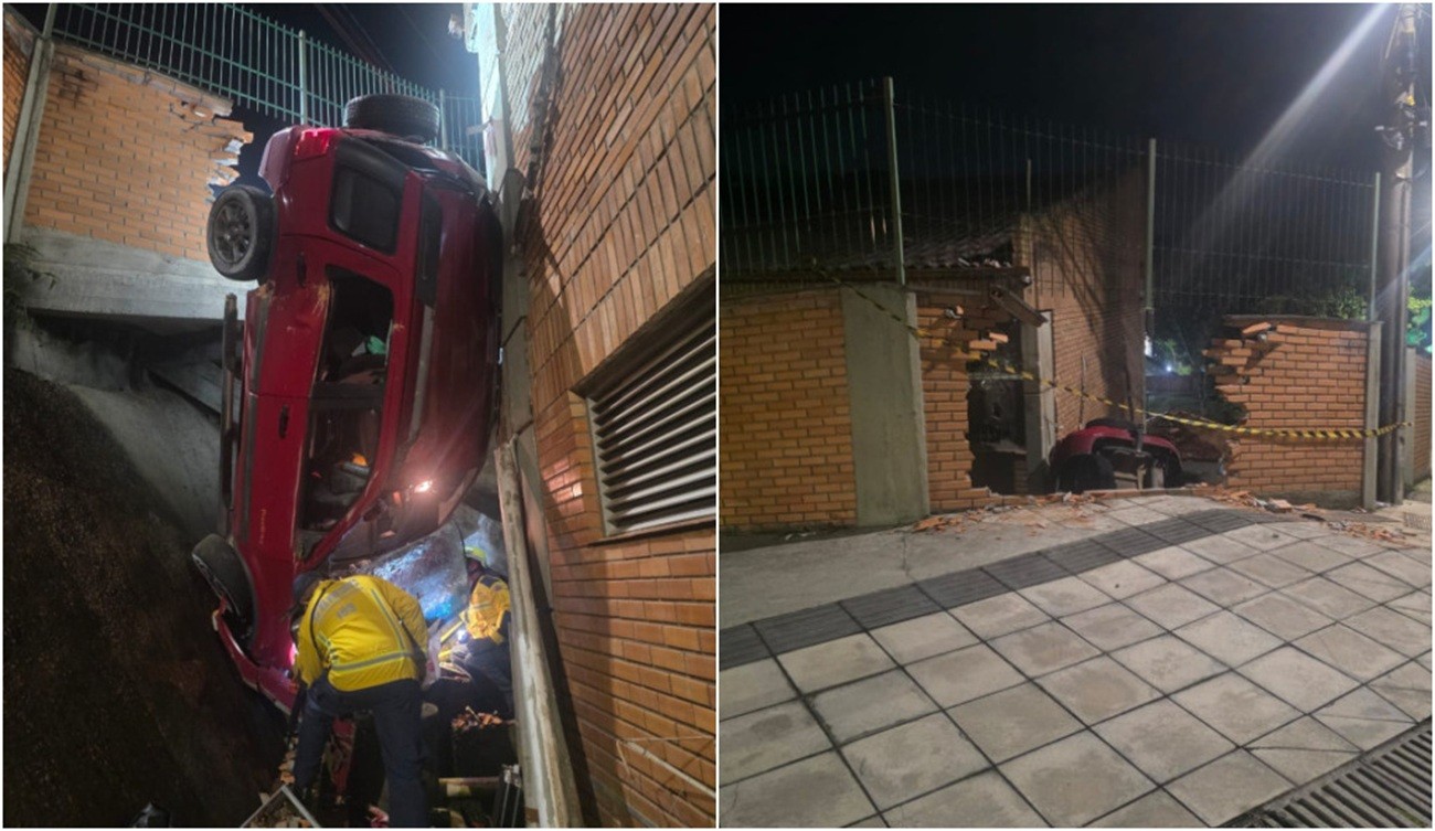 Carro fica pendurado em muro após bater e despencar em terreno de São José; VÍDEO