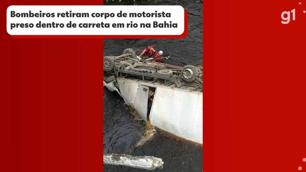 Bombeiros retiram corpo de motorista preso dentro de carreta em rio na Bahia; veja vídeo