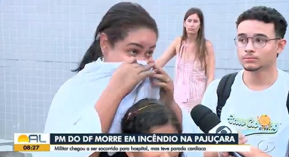 Estefanie colocou toalhas molhadas no rosto da família durante incêndio em hotel de Maceió — Foto: Reprodução/TV Gazeta