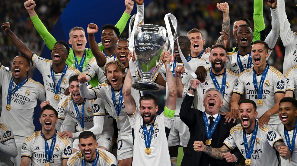 Real Madrid durante a conquista da 15ª Liga dos Campeões em 2024 — Foto: Glyn KIRK / AFP
