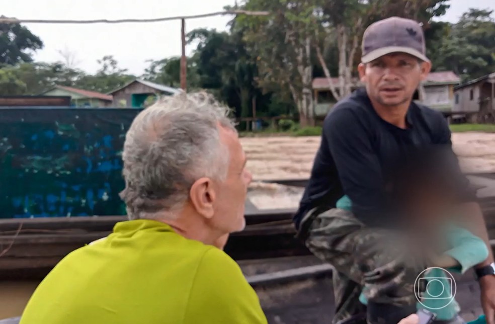 Jânio aparece em uma das últimas fotos feitas de Dom Phillips com vida, segundo a investigação.  — Foto: Reprodução/Globoplay