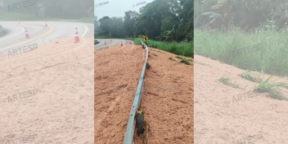 Equipes trabalham para fazer a limpeza da pista e a retirada do veículo após tombamento de caminhão na Rondon, no km 217 — Foto: Artesp/Divulgação