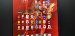 Huawei Mate XT Ultimate Design aberto com as duas dobras em destaque - uma para dentro e outra para fora