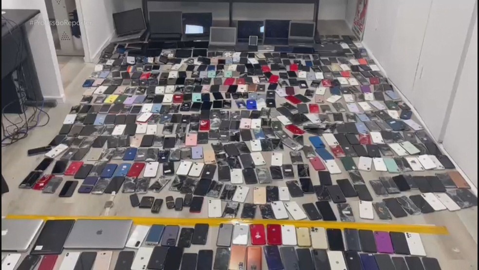 Esquema de receptação de celulares furtados e roubados é descoberto em prédio no Centro de SP — Foto: Reprodução/TV Globo