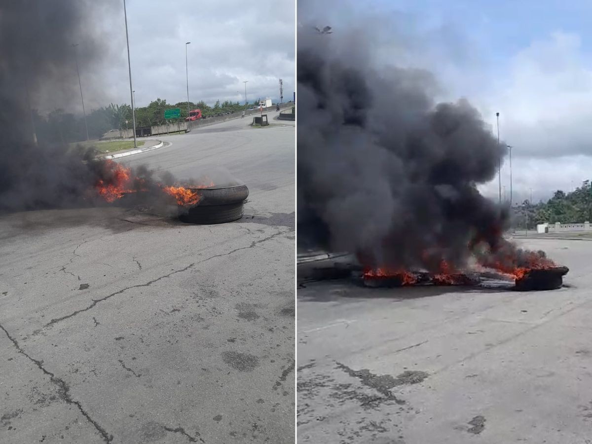 Moradores protestam e queimam pneus por atraso na mudança para o Conjunto Prainha II, em Santos; VÍDEO