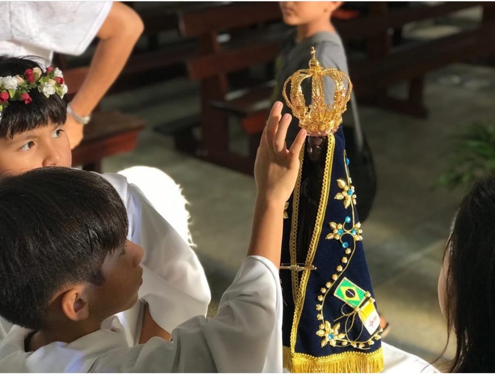 Imagem de arquivo - Criança em celebração ao dia de Nossa Senhora Aparecida, em outubro de 2020, em Boa Vista. — Foto: Arquivo pessoal