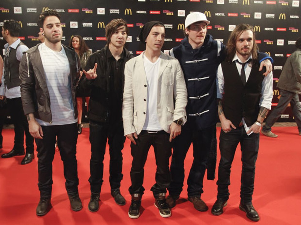 O grupo NXZero levou o prêmio de melhor música na votação popular — Foto: Ide Gomes/G1