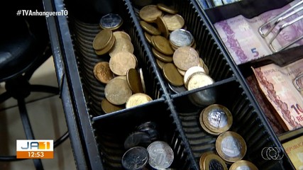 Moedas 'desaparecem' e comércios buscam estratégias