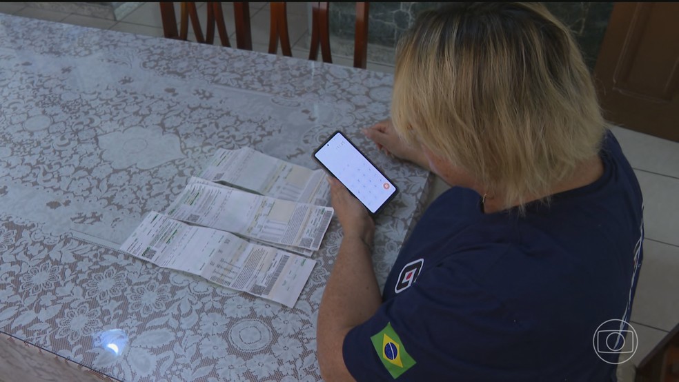 Empréstimo consignado: veja o que muda com nova regra para quem tem desconto direto no salário ou na aposentadoria — Foto: Jornal Nacional/ Reprodução