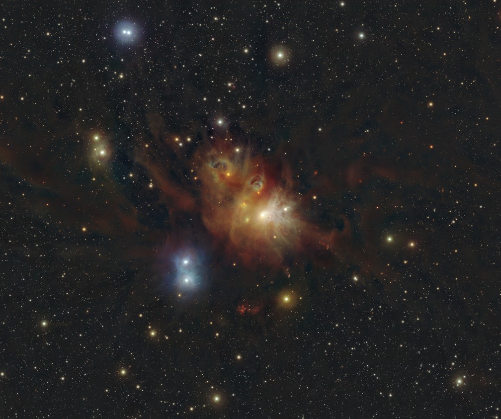 Imagem em infravermelho de uma região na constelação da Coroa Austral.  — Foto: ESO/Meingast et al.