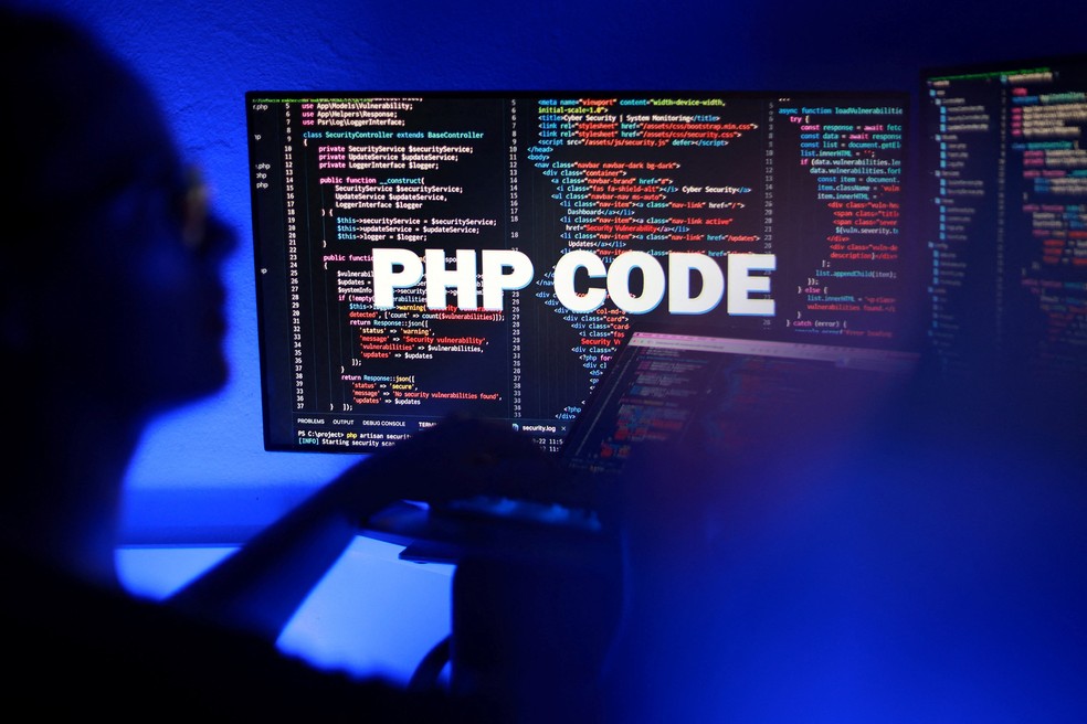 As palavras "PHP Code" no texto e código PHP são exibidas em uma tela. — Foto: As palavras "PHP Code" no texto e código PHP são exibidas em uma tela.